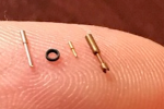 micro size components on a finger tip